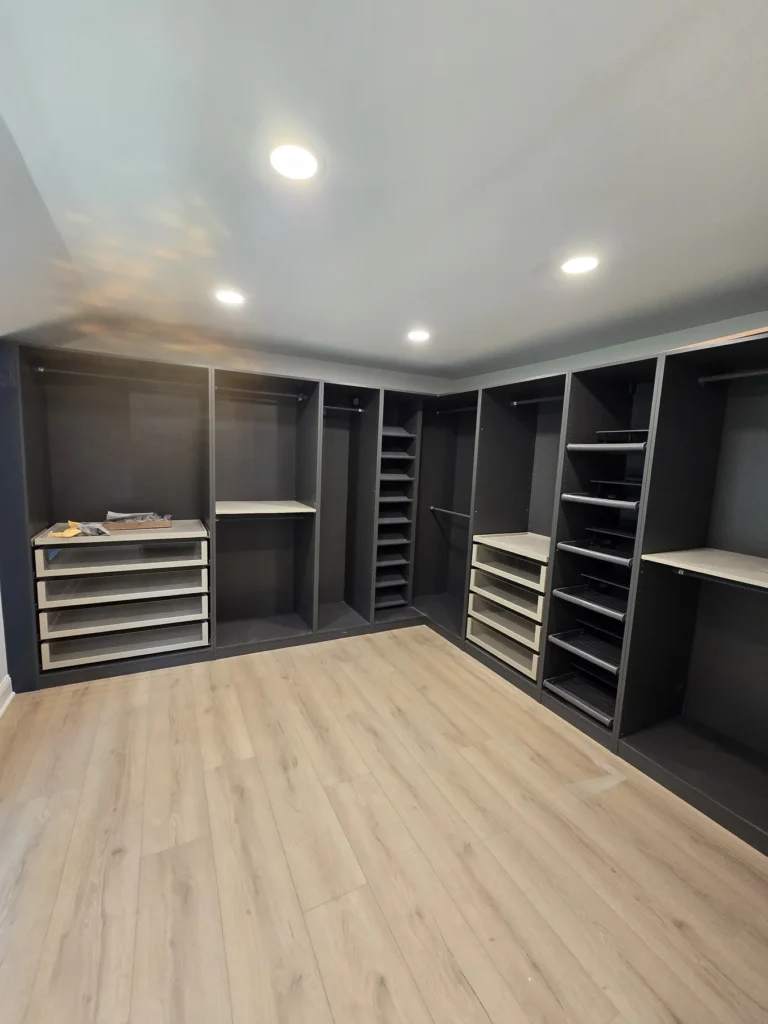 Custom walk-in closet installation with built-in shelving, drawers, and premium storage solutions by GetFix4U